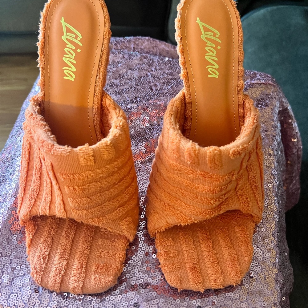 Very Cute !! Brand New!Orange sandal…. Must have